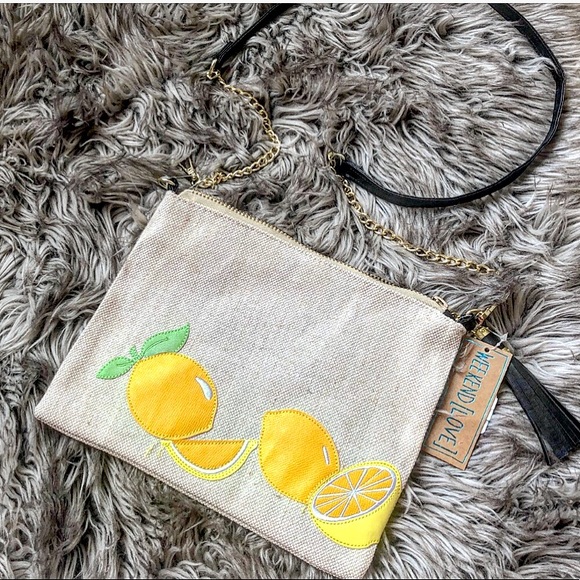 Weekend Love Handbags - NWT Weekend Love lemon print clutch with chain